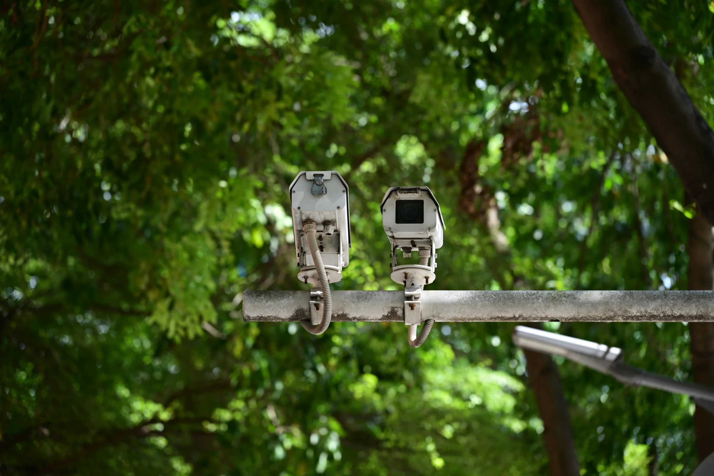 An outdoor CCTV camera monitoring a building perimeter